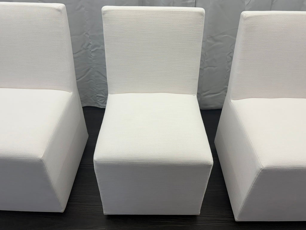 Curated Set of Four RH Ellison Fabric Dining Chairs
Perennials® Performance Textured Linen Weave — White
Recessed Caster Bases